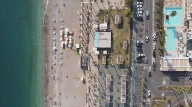 This stock footage shows aerial view of beach at the seaside resort town in Turkey in 8K resolution