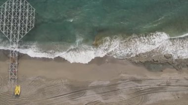 This stock footage shows aerial view of beach at the seaside resort town in Turkey in 8K resolution