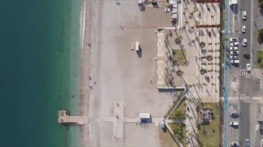 This stock footage shows aerial view of beach at the seaside resort town in Turkey in 8K resolution