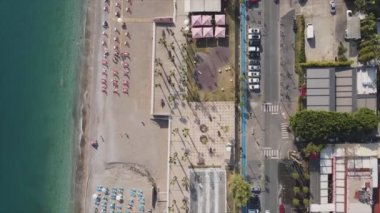 This stock footage shows aerial view of beach at the seaside resort town in Turkey in 8K resolution