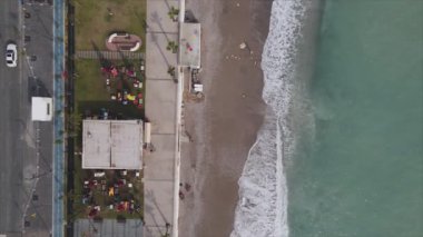 This stock footage shows aerial view of beach at the seaside resort town in Turkey in 8K resolution