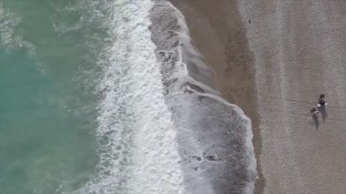 This stock footage shows aerial view of beach at the seaside resort town in Turkey in 8K resolution