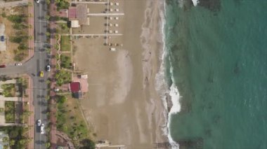 This stock footage shows aerial view of beach at the seaside resort town in Turkey in 8K resolution