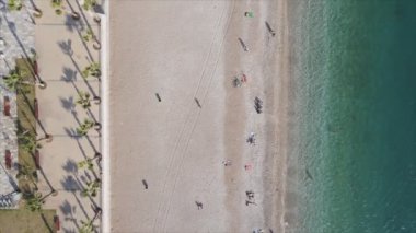 This stock footage shows aerial view of beach at the seaside resort town in Turkey in 8K resolution