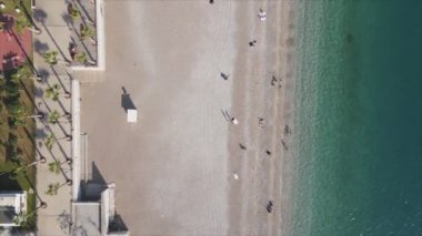This stock footage shows aerial view of beach at the seaside resort town in Turkey in 8K resolution