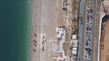 This stock footage shows aerial view of beach at the seaside resort town in Turkey in 8K resolution