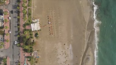 This stock footage shows aerial view of beach at the seaside resort town in Turkey in 8K resolution