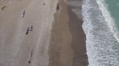 This stock footage shows aerial view of beach at the seaside resort town in Turkey in 8K resolution