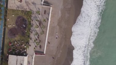 This stock footage shows aerial view of beach at the seaside resort town in Turkey in 8K resolution