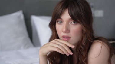 This is a stock video shows a girl in beautiful erotic sexy lingerie