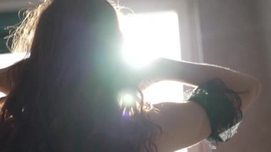 This is a stock video shows a girl in beautiful erotic sexy lingerie