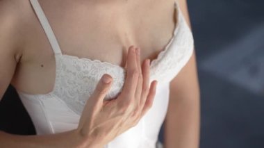 This is a stock video shows a girl in beautiful erotic sexy lingerie