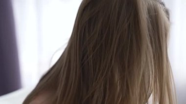 This stock video shows a girl in erotic sexy lingerie, slow motion