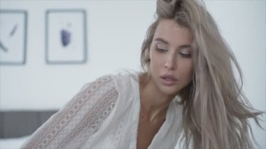 This is a stock video shows a girl in beautiful erotic sexy lingerie in 8K resolution