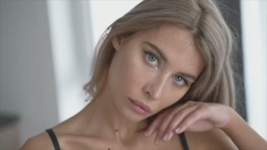 This is a stock video shows a girl in beautiful erotic sexy lingerie in 8K resolution
