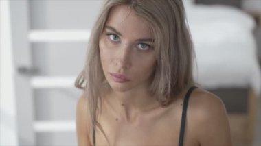 This is a stock video shows a girl in beautiful erotic sexy lingerie in 8K resolution