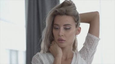 This is a stock video shows a girl in beautiful erotic sexy lingerie in 8K resolution