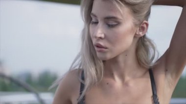 This is a stock video shows a girl in beautiful erotic sexy lingerie in 8K resolution