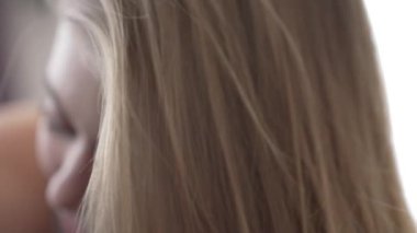 This stock video shows a girl in erotic sexy lingerie, slow motion