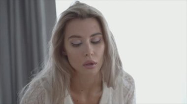 This is a stock video shows a girl in beautiful erotic sexy lingerie in 8K resolution