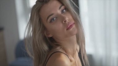 This is a stock video shows a girl in beautiful erotic sexy lingerie in 8K resolution