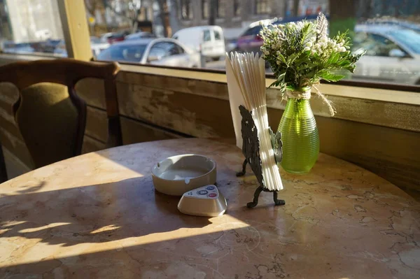 Napkin Holder Ashtray Bouquet Flowers Cafe Table — Stock Photo, Image