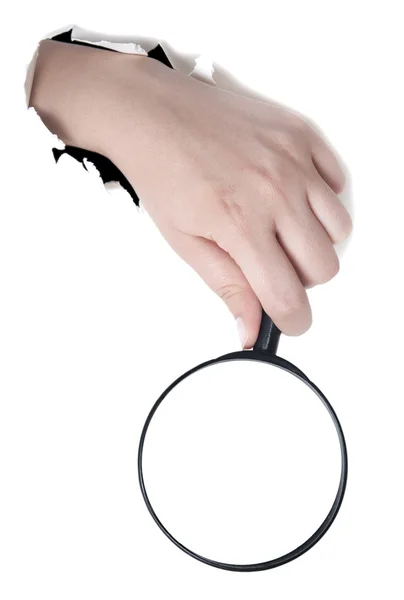 Magnifying glass in hand — Stock Photo, Image