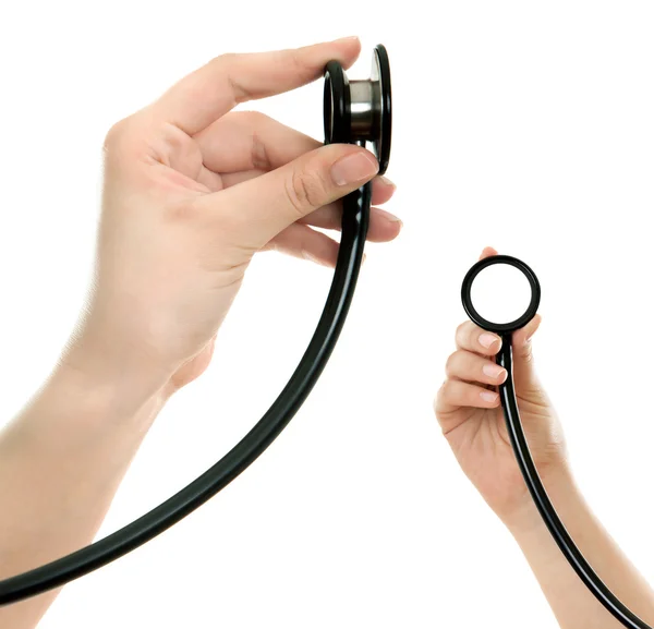 Stethoscope in hand — Stock Photo, Image