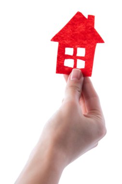 Eldeki ev, beyaz üzerinde izole edilmiş.