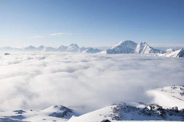 Sea of clouds on the slopes of mount Elbrus — Stock Photo, Image