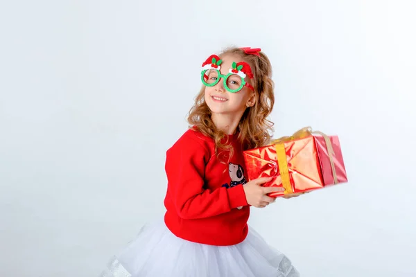 Little Girl Carnival Christmas Glasses Holding Gift White Background Stock Image