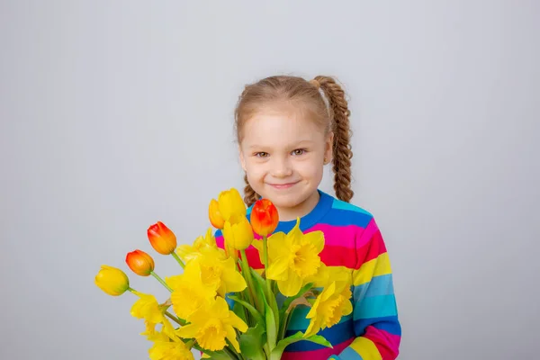 Cute Little Girl Multicolored Sweater Holds Bouquet Spring Flowers White — Foto Stock
