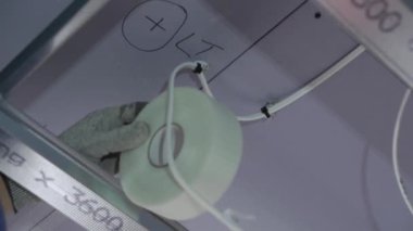 Hard male work on construction site. professional worker in special uniforms Contractors Safety Hats repairing ceiling wall inside building. Builders equipment at workplace. industrial premises.