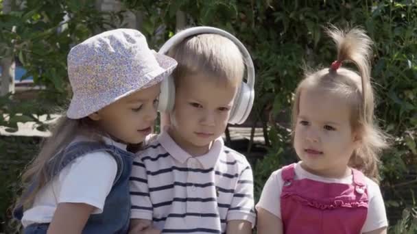 Portrait Cute Little Three Children Headphones Listening Music Cheerful Carefree — Video Stock