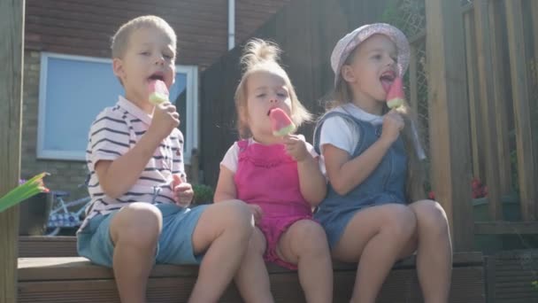 Three Cute Little Children Enjoys Delicious Ice Cream Cone Child — Video Stock