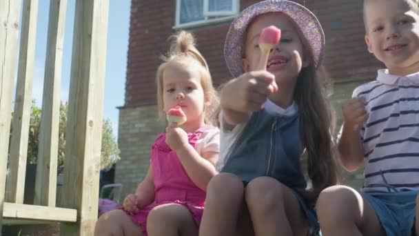Three Cute Little Children Enjoys Delicious Ice Cream Cone Child — Video