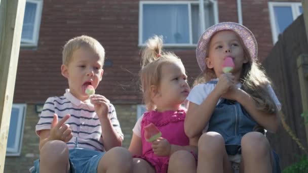 Three Cute Little Children Enjoys Delicious Ice Cream Cone Child — Video