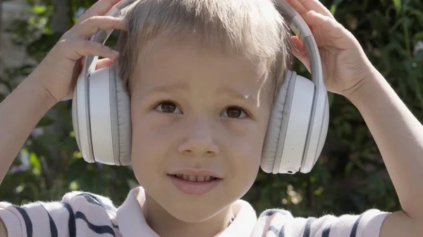 Portrait Cute Little Boy Headphones Listening Music Cheerful Carefree Childhood — Stock fotografie
