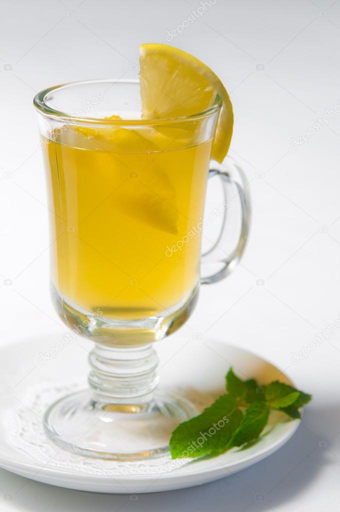 Glass of fresh lemon and mint drink