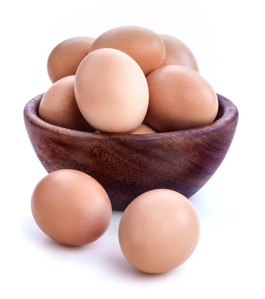 Ägg i en träskål — Stockfoto