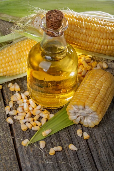 Corn with corn oil — Stock Photo, Image