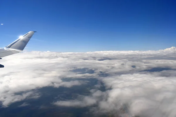 Viewed Airplane Window Blue Sky Horizon White Clouds Floating Land — Foto Stock
