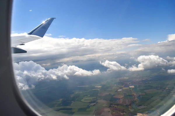 See Airplane Window Beautiful Blue Sky White Clouds Floating Green — Fotografia de Stock