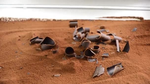 Drops a piece of chocolate into tiramisu — Stock Video