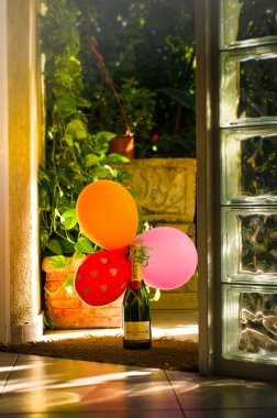 Bottle Moet and Chandon with three balloons