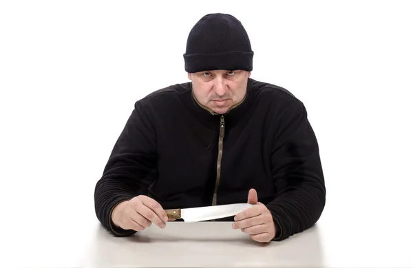 Middle-aged hooligan in black clothes with a knife — Stock Photo, Image