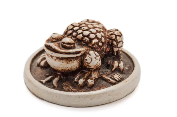 Rospo Netsuke su una moneta d'oro — Foto Stock