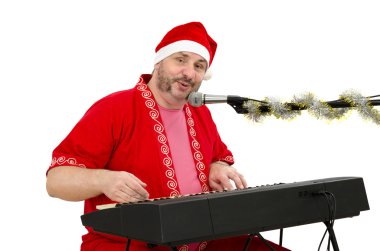 Santa çalış ve elektrikli piyano sings