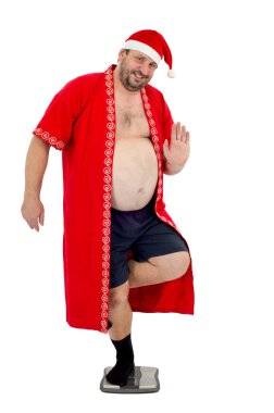 kilolu santa ölçeklerde tek ayak üzerinde duruyor.