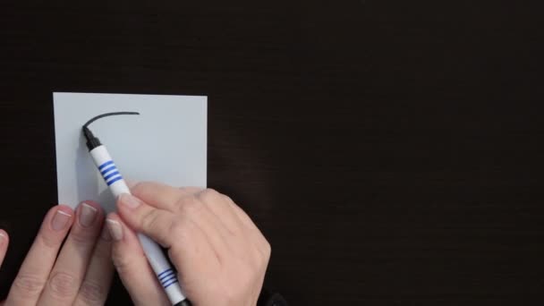 Businesswoman draws smiley Winking — Stock Video